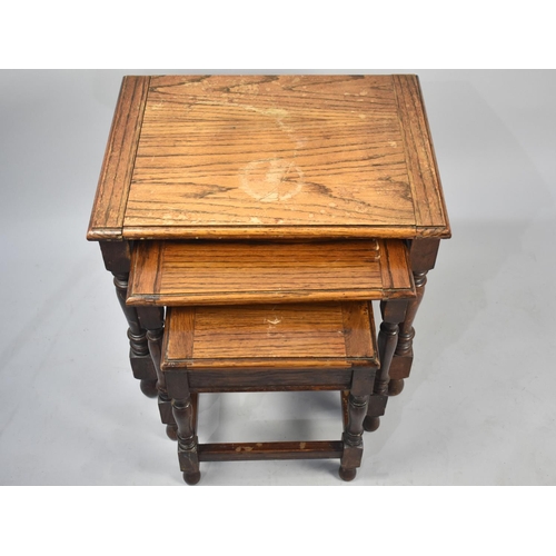 130 - A Mid 20th Century Oak Nest of Three Tables, 55cms Wide