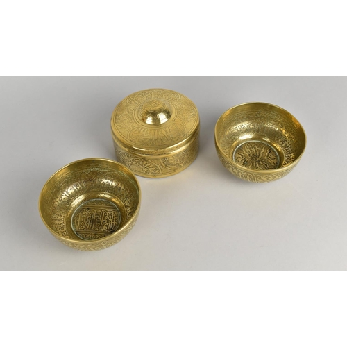 176 - A Pair of Indian Brass Bowls with Engraved Islamic Decoration, 10.5cms Diameter together with a Simi... 