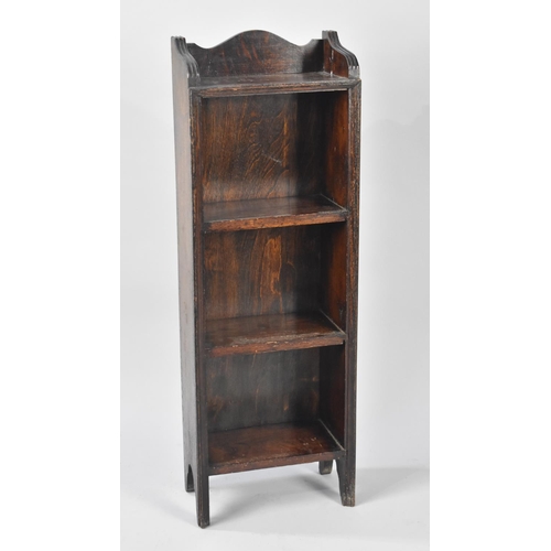 177 - An Edwardian Oak Four Shelf Galleried Narrow Open Bookcase, 31cms Wide and 92cms High