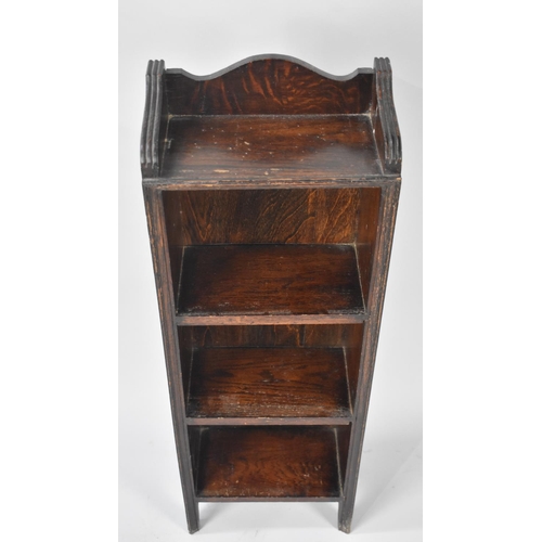 177 - An Edwardian Oak Four Shelf Galleried Narrow Open Bookcase, 31cms Wide and 92cms High