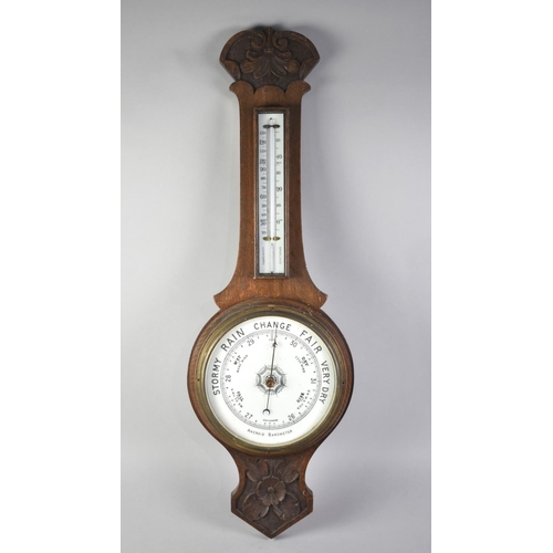 183 - A Late Victorian/Edwardian Wall Hanging Wheel Aneroid Barometer with Thermometer, Carved Onion Top