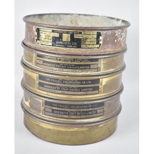 201 - A Stacking Set of Four Laboratory Test Sieves by Endecotts Ltd, 21cms Diameter