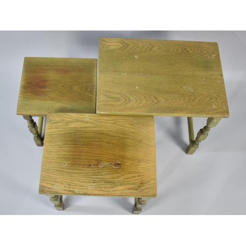 260 - A Mid 20th Century Oak Nest of Three Tables, 51cms Wide