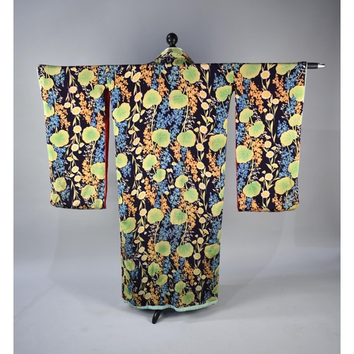 264 - An Early/Mid 20th Century Silk Kimono, Floral on Dark Blue Ground with Red Lining (Some Condition Is... 