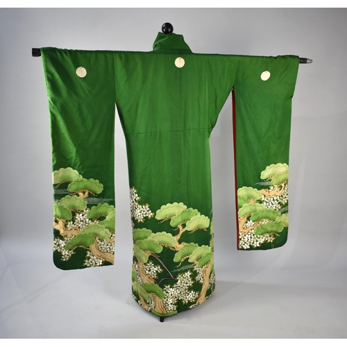 266 - An Early/Mid 20th Century Silk Printed and Embroidered Kimono, Green Ground with Blossoming Trees an... 