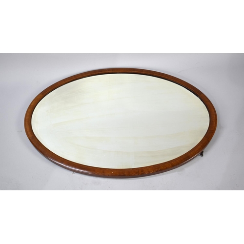 278 - An Edwardian Oval Inlaid Mahogany Wall Mirror with Bevelled Glass, 97cms by 66cms Overall