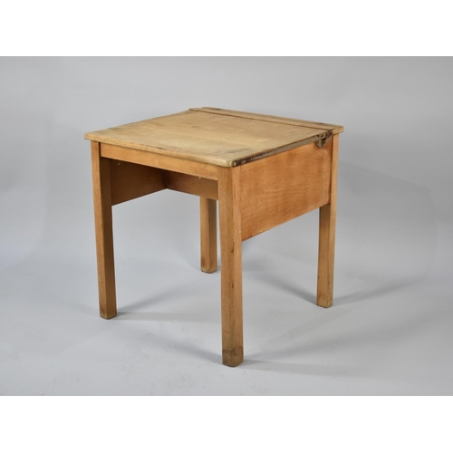 279 - A Mid 20th century Lift Top Childs Desk, 56cms Wide