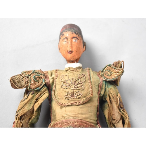 29 - A 19th Century Chinese Opera Emperor Doll with Wire Embroidered Tunic and Painted Head, 27cms High