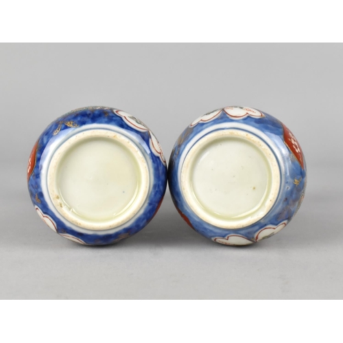 292 - A Pair of Japanese Porcelain Bottle Vases Decorated in the Imari Palette 12cm high