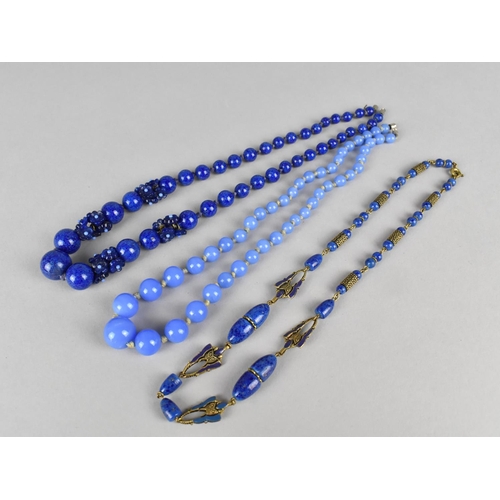 304 - A Collection of Various Early 20th Century Blue Glass Bead Necklaces to include One with Enamelled S... 