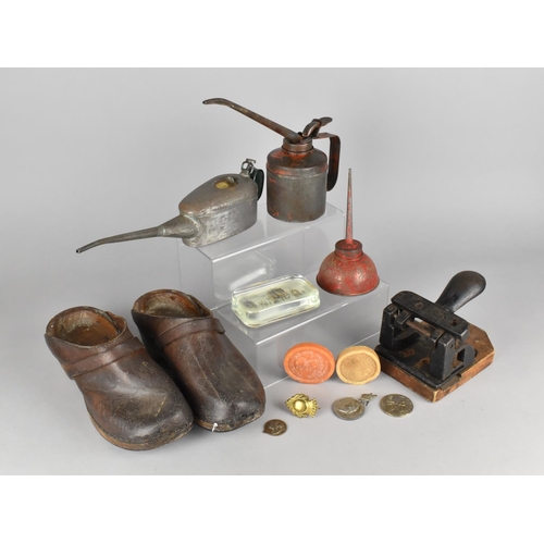 316 - A Collection of Various Vintage Items to Comprise Oil Cans, Wooden and Leather Clogs, Hole Punch, Wa... 