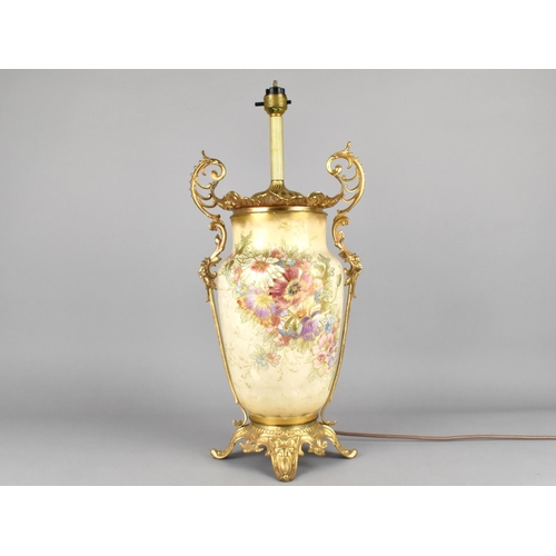 384 - A German Blush Ivory Floral Decorated Lamp Base of Urn Form with Gilt Metal Mounts, 47cm high Max