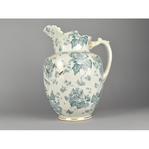 396 - A Late 19th/Early 20th Century Toilet Jug with Transfer Printed Floral Decoration (Staple Repair), 3... 