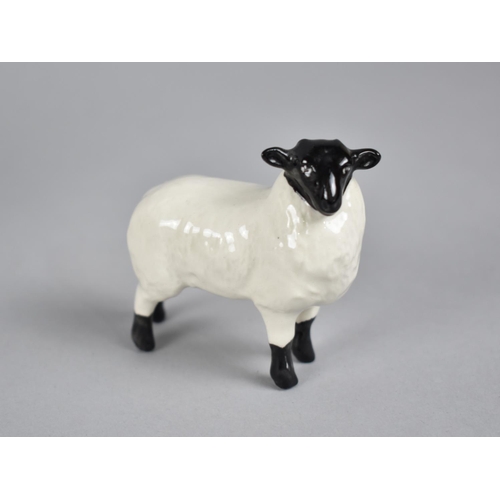 402 - A Beswick Hound, Sheep and Donkey