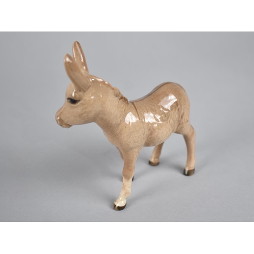 402 - A Beswick Hound, Sheep and Donkey