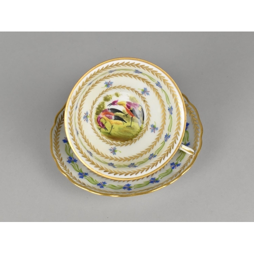 414 - An Early 20th Century Porcelain Cup and Saucer Decorated with Alternating Bands of Gilt Laurel and B... 