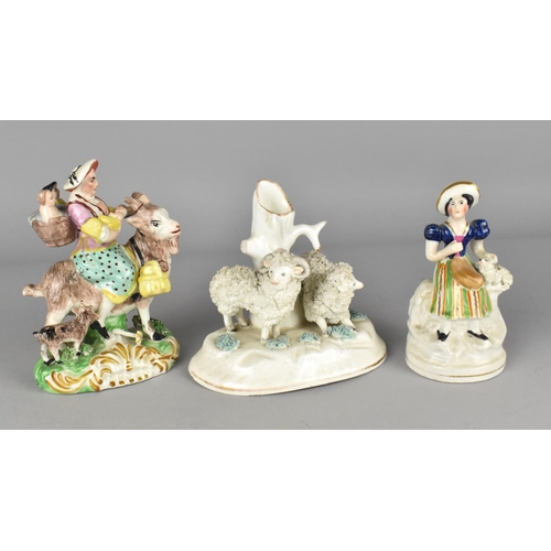 419 - A Staffordshire Type Figure Group, The Tailor's Wife Riding Goat, 13cm high together with a Sheep Sp... 