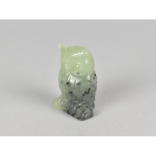 43 - A Carved and Signed Jade Study of a Long Eared Owl, 5cms High