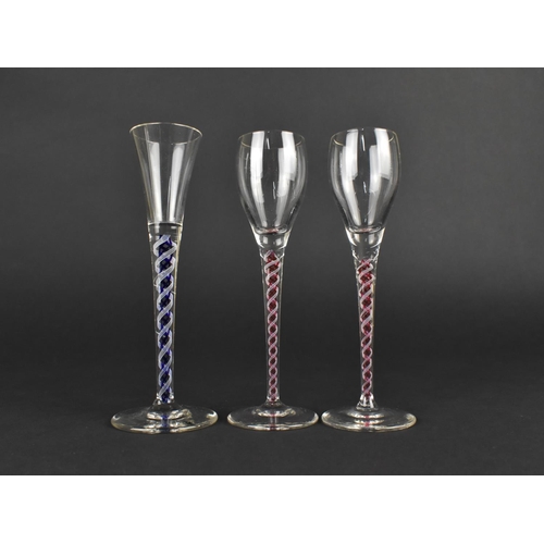 430 - Three Double Air Twist Stemmed Glasses all with Plain Glass Bowls, Two with White and Red Twists the... 