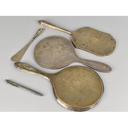 446 - Three Silver Mounted Dressing Table Mirrors, a Small Silver Mounted Shoe Horn and a Swiss White Meta... 