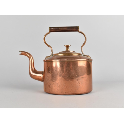 45 - A Vintage Two Pint Copper Kettle by The Army & Navy Stores, 19cms High