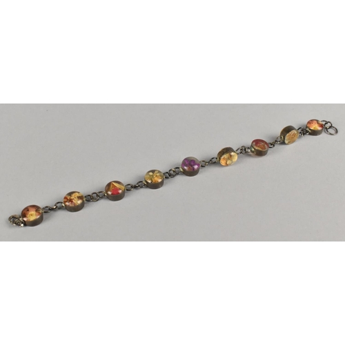 458 - A Silver Mounted Bracelet, Circular Panels with Dried Flowers to the Interior, 19.5cms Long