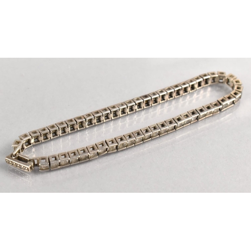 461 - A Silver and White Stone Tennis Bracelet, 18.5cms Long