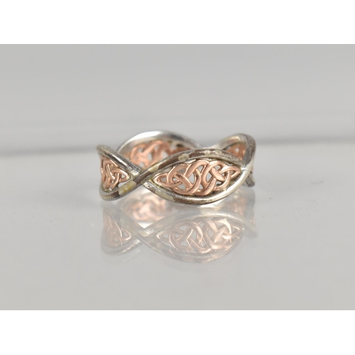 468 - A Silver and Gold Clogau Ring, Lozenge Panels with Celtic Knot Design, 3.1gms, Size T