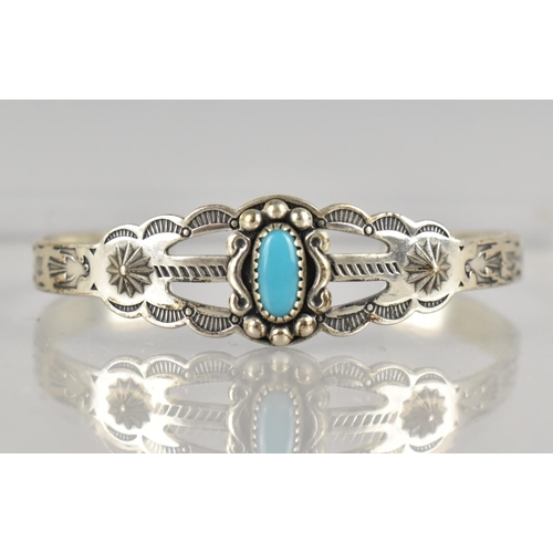 474 - A Small Childs Navajo Bangle with Turquoise Cabochon, Decorated with Thunderbirds, Arrows Etc and St... 