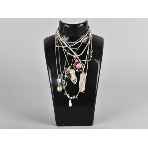 479 - Three Silver Necklaces, all with Various Eastern Silver Charms to include Egyptian Pendant, Pink Moo... 