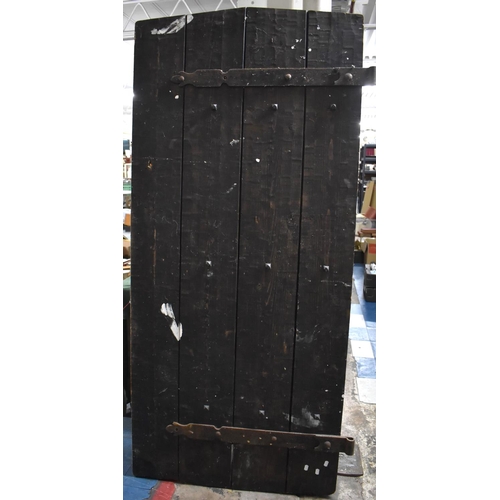 523 - A Large Wooden Four Plank Door with Iron Mounts and Studding, 86cm x 192cm