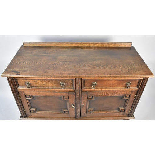 538 - An Edwardian Oak Sideboard with Two Top Drawers and Galleried Back, 123cms Wide