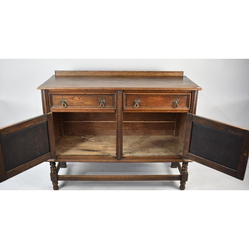 538 - An Edwardian Oak Sideboard with Two Top Drawers and Galleried Back, 123cms Wide