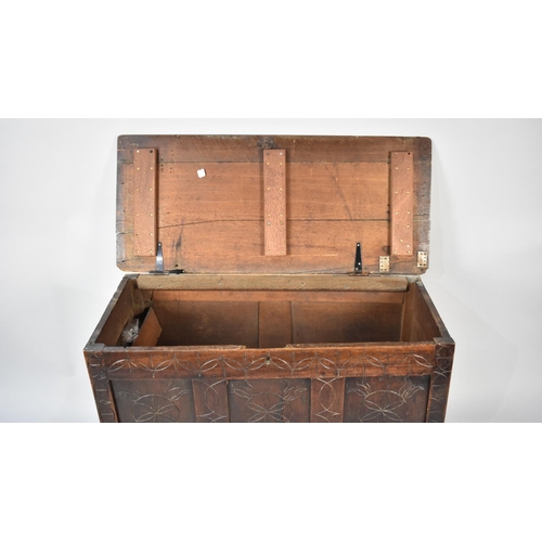 544 - A 19th Century Oak Coffer Chest with Lift Top and Three Panel Front, Later Carved Decoration, 105cms... 