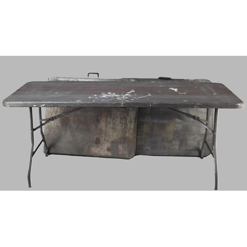 564 - A Set of Three Folding Metal Framed Trestle Tables