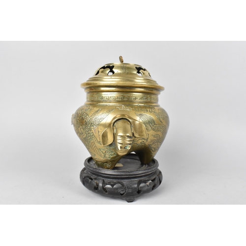 58 - A Chinese Bronze Globular Lidded Censer with Elephant Head Handles and Engraved Body on Unrelated Pi... 