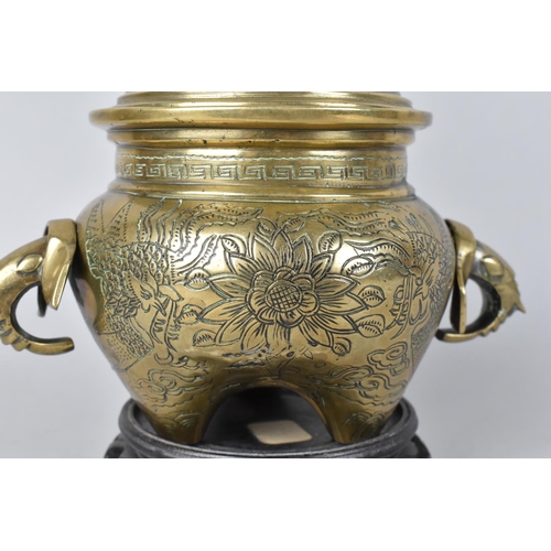 58 - A Chinese Bronze Globular Lidded Censer with Elephant Head Handles and Engraved Body on Unrelated Pi... 