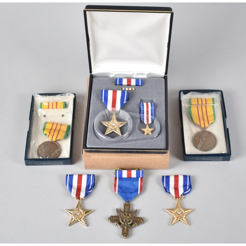 61 - A Collection of American Bronze Star Medals together with Two Vietnam Service Medals