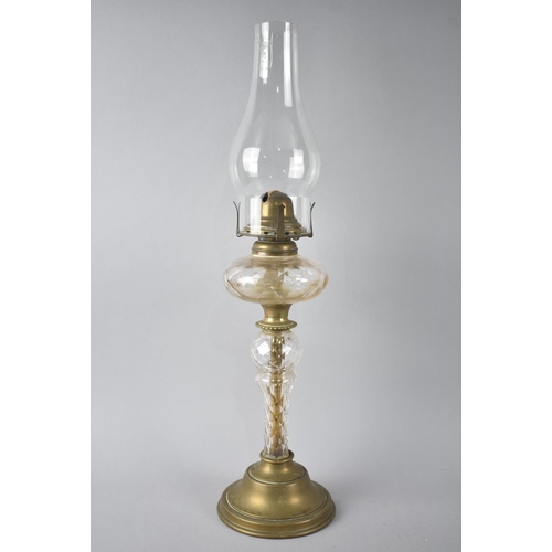 79 - An Edwardian Brass and Glass Oil Lamp with Plain Chimney, 50cms High