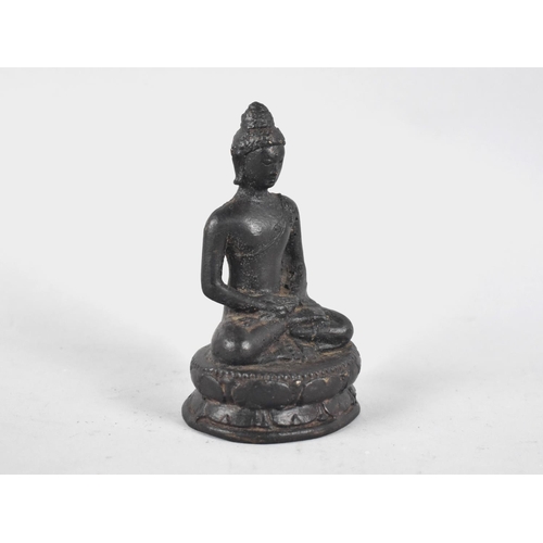 96 - An Early Patinated Bronze Study of Seated Buddha on Oval Lotus Throne, 12.5cms High