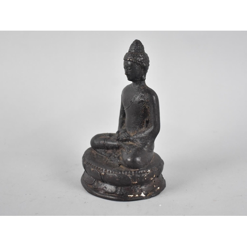 96 - An Early Patinated Bronze Study of Seated Buddha on Oval Lotus Throne, 12.5cms High