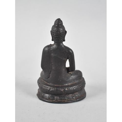 96 - An Early Patinated Bronze Study of Seated Buddha on Oval Lotus Throne, 12.5cms High