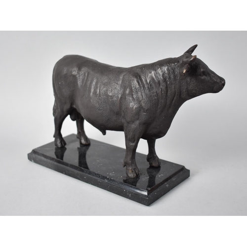 120 - A Reproduction Patinated Bronze Study of a Continental Bull on Marble Plinth, 24cms Long