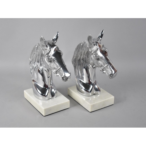 152 - A Pair of Aluminium and Marble Horse Head Bookends, 23cms High