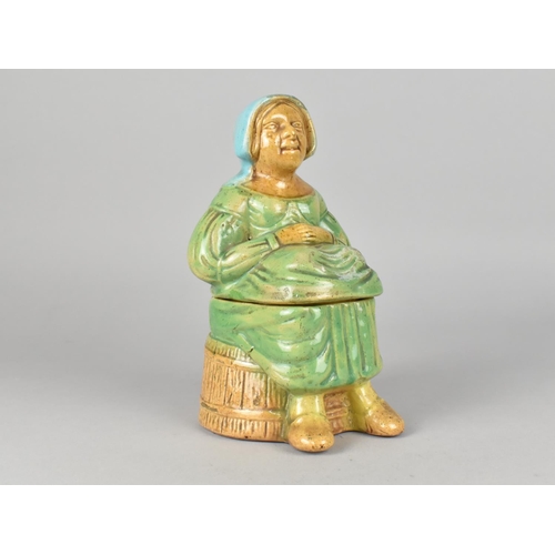 103 - A Continental Majolica Glazed Novelty Dutch Tobacco Box in the Form of Lady Sat on Barrel , 19cm Hig... 