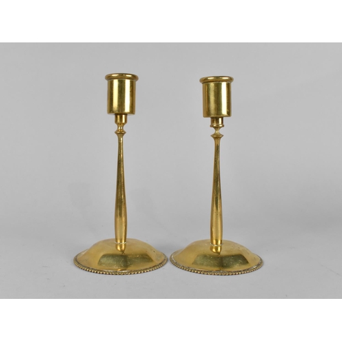 123 - A Pair of Brass Candlesticks on Circular Bases , 17cm High