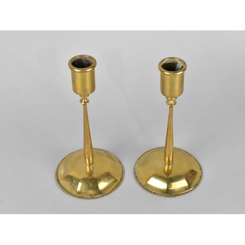 123 - A Pair of Brass Candlesticks on Circular Bases , 17cm High