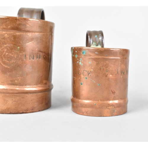 124 - A Set of Four Graduated Copper Measures , One for Mason's Arms and Three for The Cock Inn