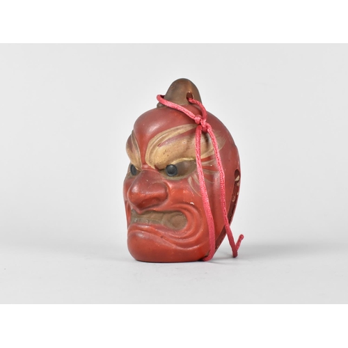 16 - A Japanese Bell, Painted Mask in the Form of a Snarling Demon to Ward Off Evil Spirits, 11cm High