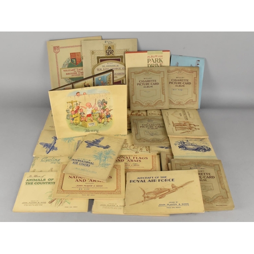 234 - A Collection of Various Cigarette Card Albums and Contents